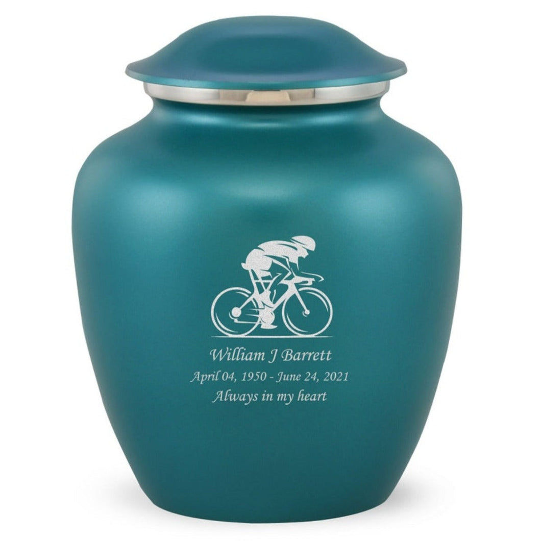 Grace Bicyclist Adult Cremation Urn in Teal, Grace Bicyclist Adult Custom Engraved Urns for Ashes in Teal, Embrace Bicyclist Adult Cremation Urn in Teal, Embrace Bicyclist Adult Urn for Ashes in Teal, Embrace Bicyclist Cremation Urn in Teal, Embrace Bicyclist Urn for Ashes in Teal, Grace Bicyclist Urn for Ashes in Teal, Grace Bicyclist Cremation Urn in Teal - ExquisiteUrns